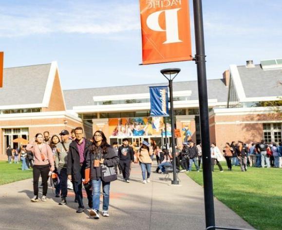 students walking in front of the derosa university center